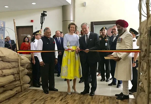 Queen Mathilde wore Natan new collection floral skirt, Natan top, and natan pumps at Indian university's lunch