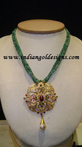 Gold and Diamond jewellery designs: Emerald beads necklace with gold ...