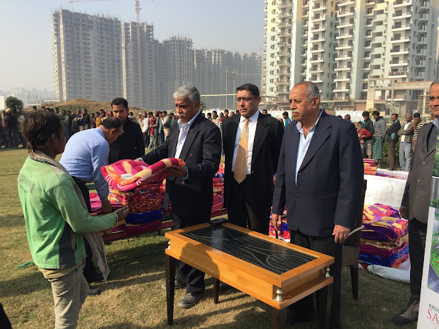 Avneesh Sood of Eros group distributes blankets  in greater noida