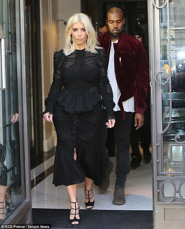268837A400000578 2989458 Another day another show Kim Kardashian and Kanye West seen leav m 91 1426070749695 Kim K steps out in more bizzare outfits in Paris