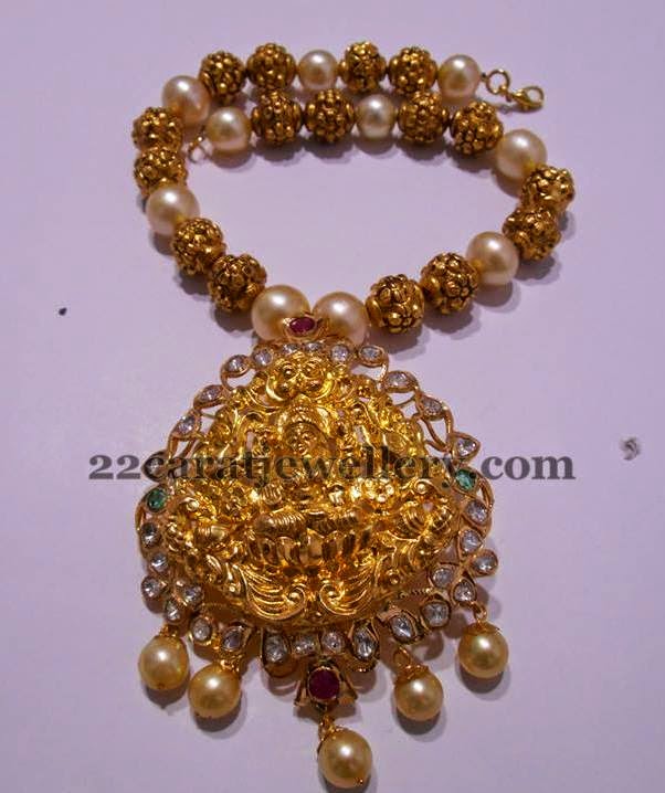 So, when and where should we visit you? South sea pearl choker with diamond emerald pendant and taar mala strung with south sea pearls, nakshi balls, emerald beads and tanzanites by Amarsons Pearls & Jewels.