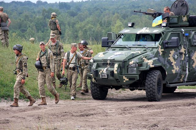 Ukrainian_soldiers_with_KrAZ-Spartan_4x4