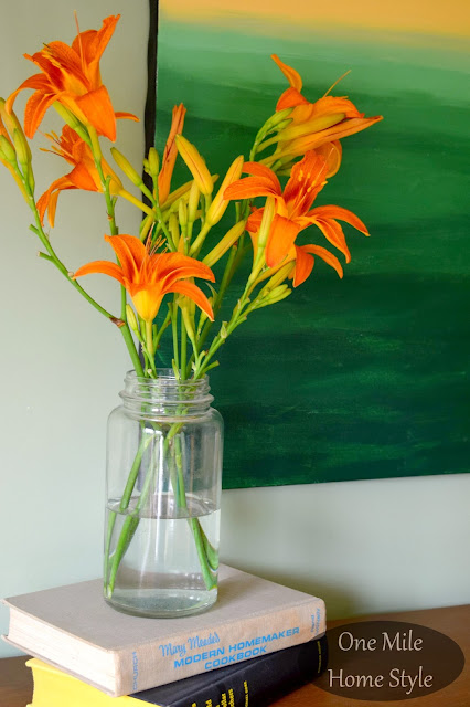 Orange Lilies, Vintage Books and Abstract Painting - One Mile Home Style