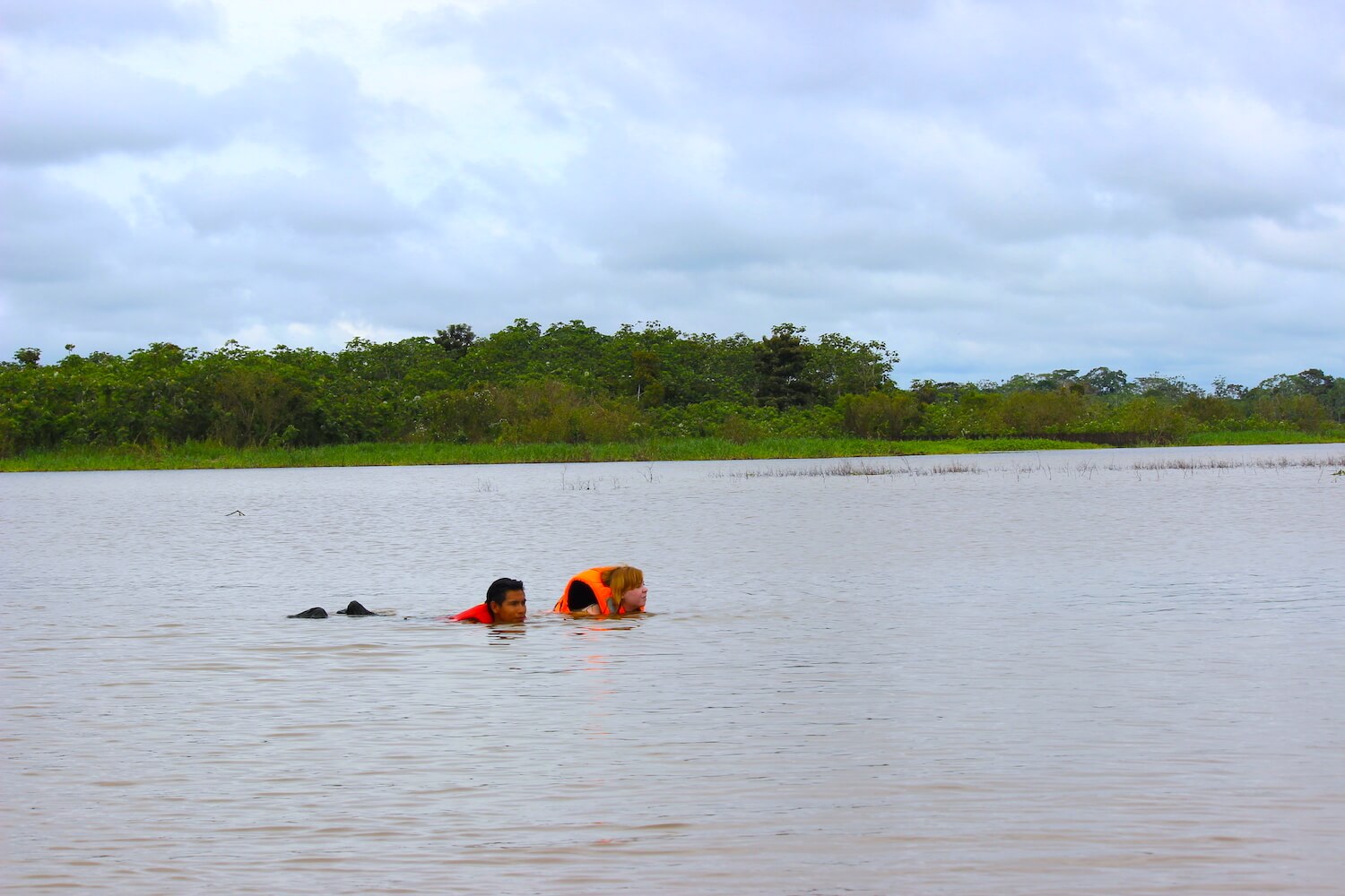 peruvian amazon swimming in river