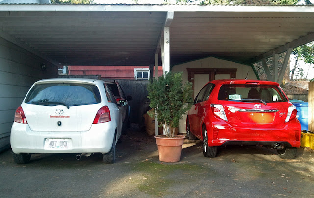2007 Toyota Yaris hatchback next to the 2012 Toyota Yaris SE hatchback - Subcompact Culture