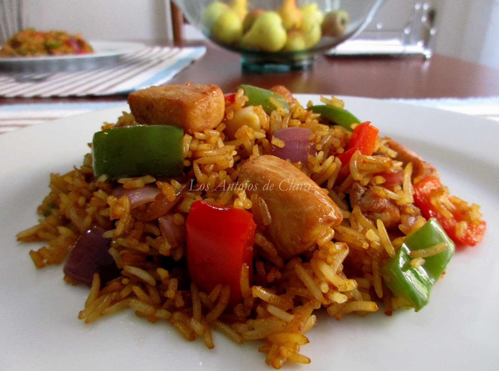 Los Antojos de Clara Arroz basmati salteado con pollo, cebolla y pimientos