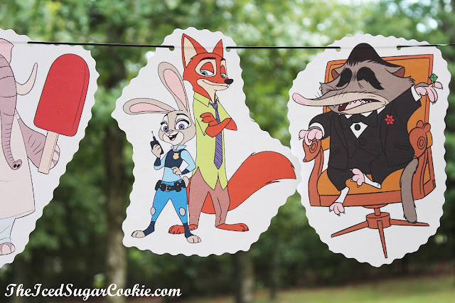 Make Your Own DIY Zootopia Food Label Cards And Hanging Flag Banner by The Iced Sugar Cookie-Mole Mr Big, Nick Fox, Judy Bunny, Flash Sloth, Elephant Jerry