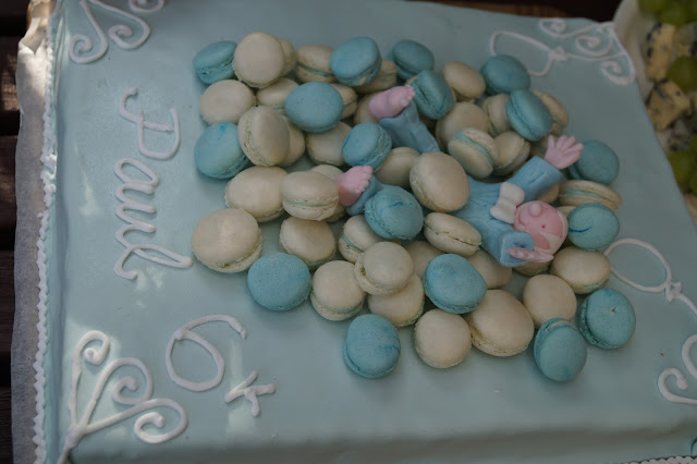 French-themed style birthday party cake with macaroonis