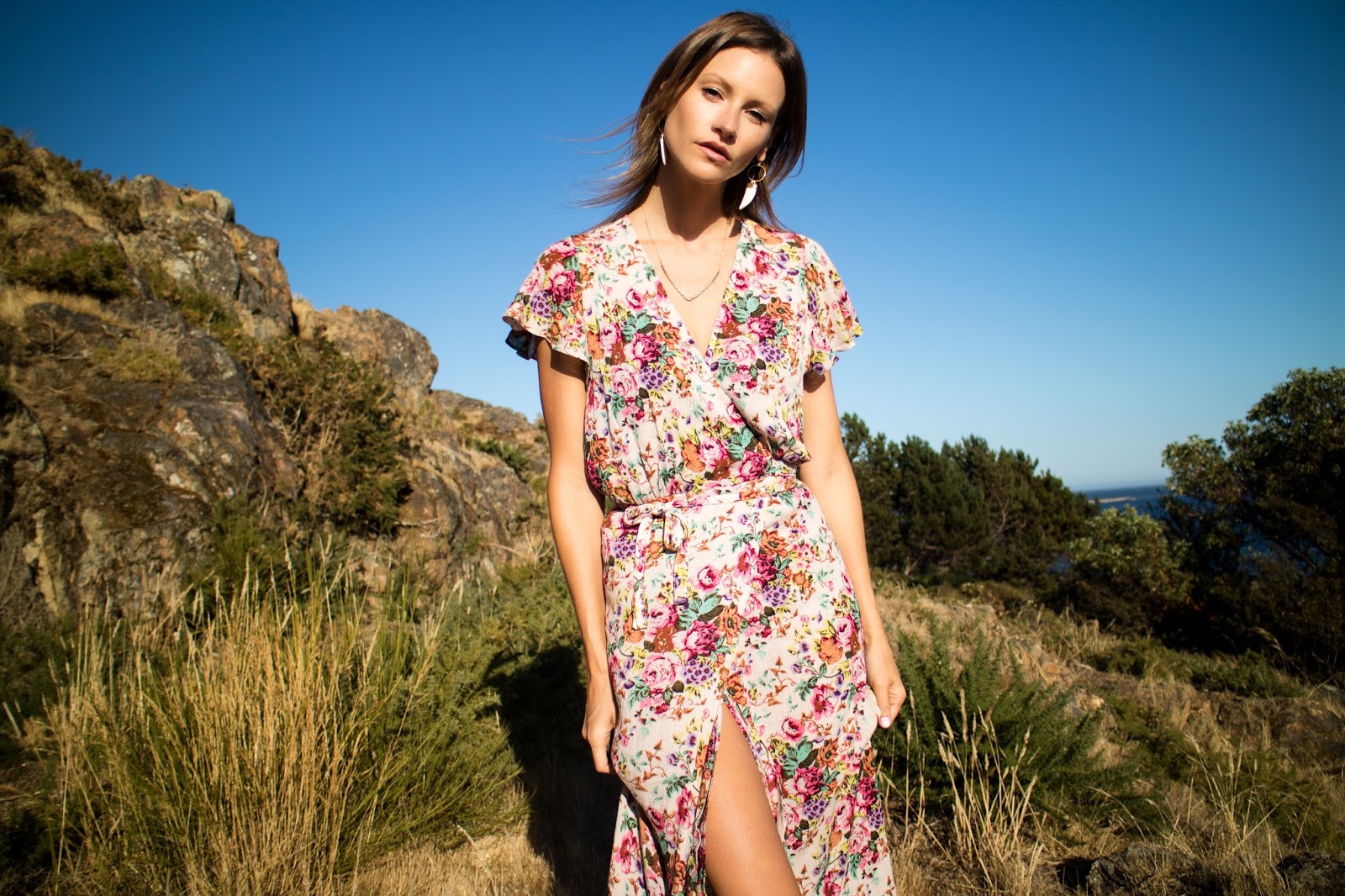 fashion blogger, Alison Hutchinson, is wearing an Auguste the label floral maxi dress and Sarah Mulder Jewelry
