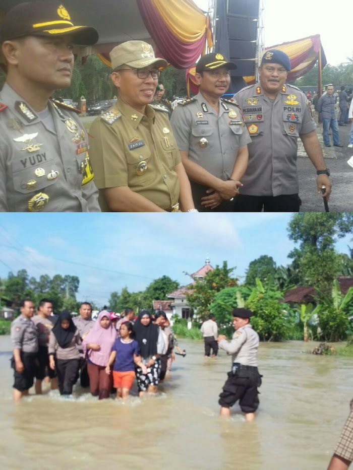 Kapolres Lamtim Pimpim Langsung evakuasi Korban banjir.
