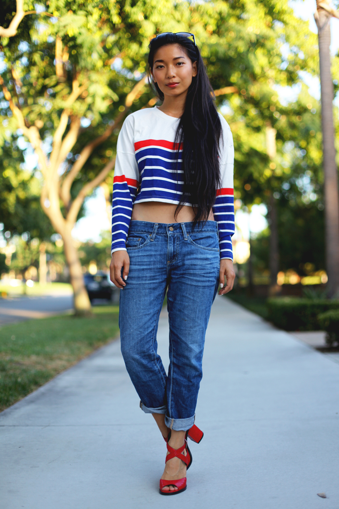Stephanie Liu of Honey & Silk sharing 3 ways to style the essential red heels. First up, wearing Choies shirt, AG Piper Crop jeans, Paul Frank subtle and sure sunglasses, and Kelsi Dagger Blanca heels