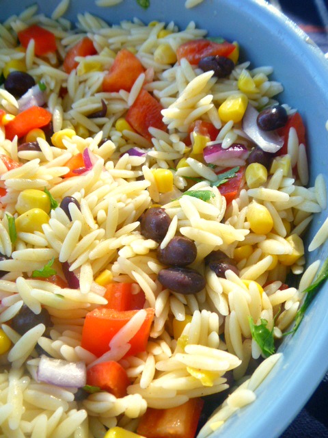 Orzo Black Bean Salad:  Imagine tender, earthy black beans tossed with al dente orzo pasta and fresh vegetables and then doused with a fresh spicy lime dressing!  Heaven!  - Slice of Southern