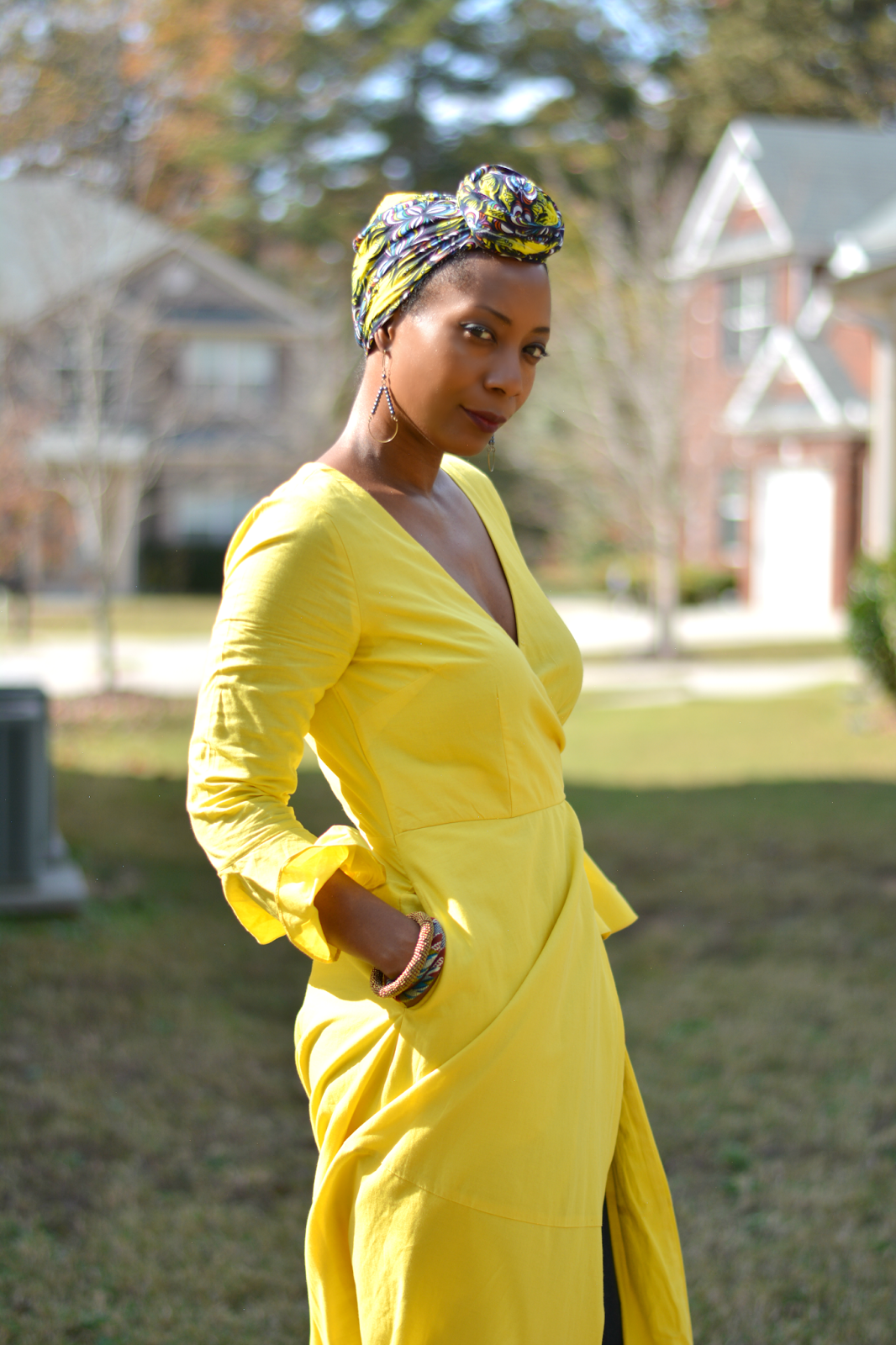 Custom eShakti yellow maxi dress worn with jeans underneath and DVF boots from the thrift store.