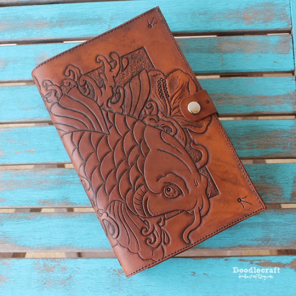 http://www.doodlecraftblog.com/2014/11/leather-tooled-book-cover-with-koi-and.html