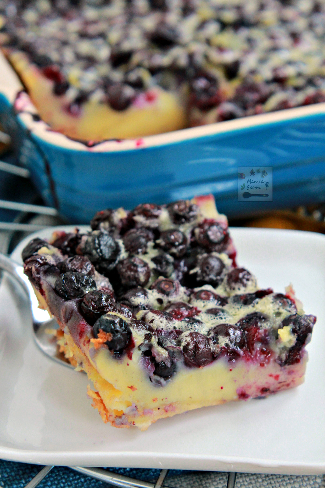 So easy -- simply dump the blueberries in the pan, cover in vanilla custard or flan batter then bake! This French berry dessert - Blueberry Clafoutis is the perfect vehicle for your favorite summer fruit! 