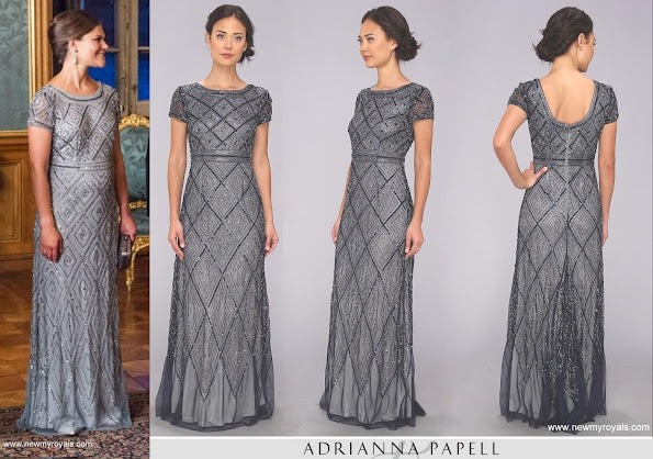 Pregnant Crown Princess wore Adrianna Papell Cap Sleeve Beaded Illusion dress.