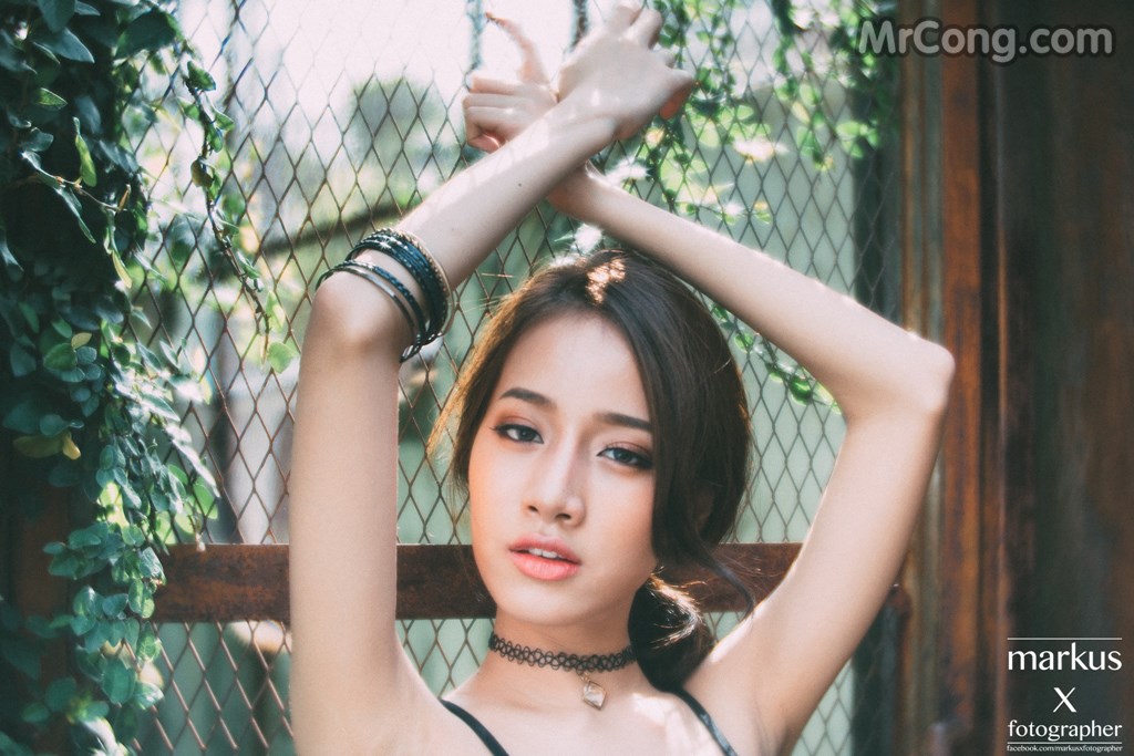 Beautiful Pichana Yoosuk shows off her figure in a black swimsuit (19 photos)