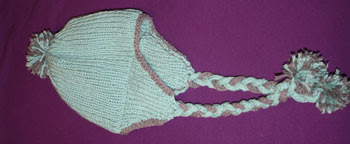 Seafoam/gray variation of the free earflap hat knitting pattern.