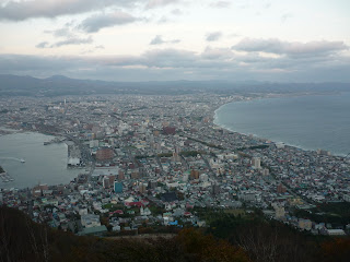 Hakodate city during the day taken from Mount Hakodate with ocean on both sides