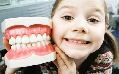 cách chăm sóc răng cho bé sau nhổ răng