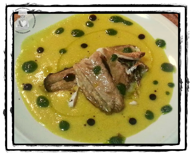 un branzino a pois su crema di risotto alla curcuma e zafferano