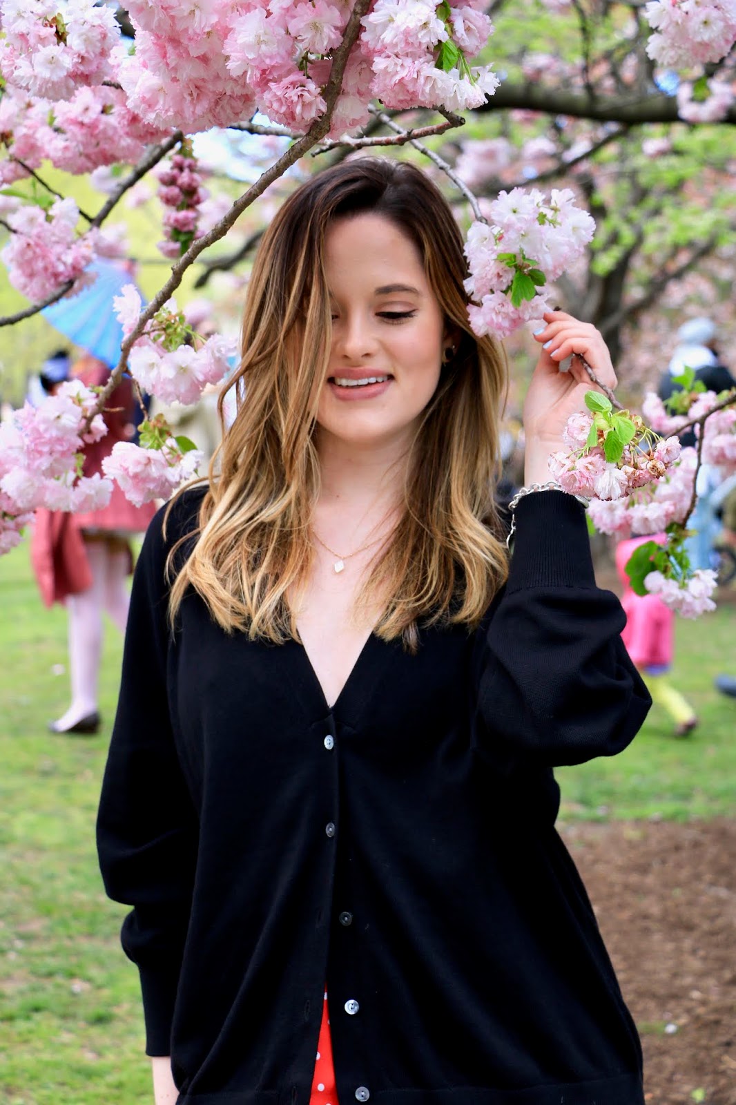 Nyc fashion blogger Kathleen Harper showing how to wear a grandpa cardigan