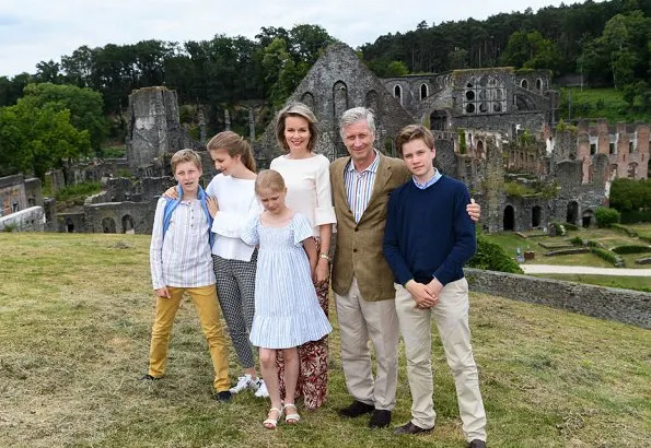 Queen Mathilde wore Dries Van Noten trousers, white bell Sleeve Stretch Crepe Top. Crown Princess Elisabeth and Princess Eleonore