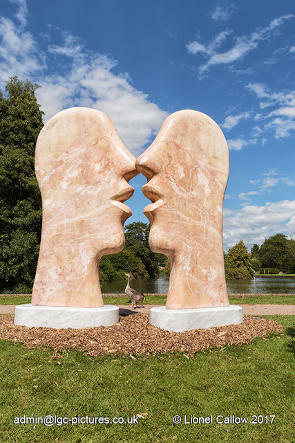 Close Paul Vanstone this sculpture is of two heads facing each other they stand about 12 feet high made marble. Spectacular.