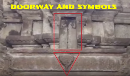 The carved symbol and the doorway above the doors at the Temple in India.