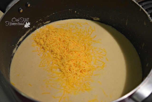 Add milk and broth to potato soup.