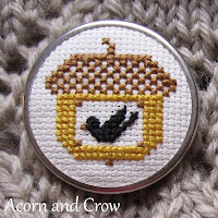 Free printable acorn and crow cross-stitch chart