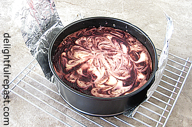 Cherry Swirl Cheesecake - Instant Pot (or other electric pressure cooker) - this photo shows foil sling used to lift hot pan out of the pot / www.delightfulrepast.com