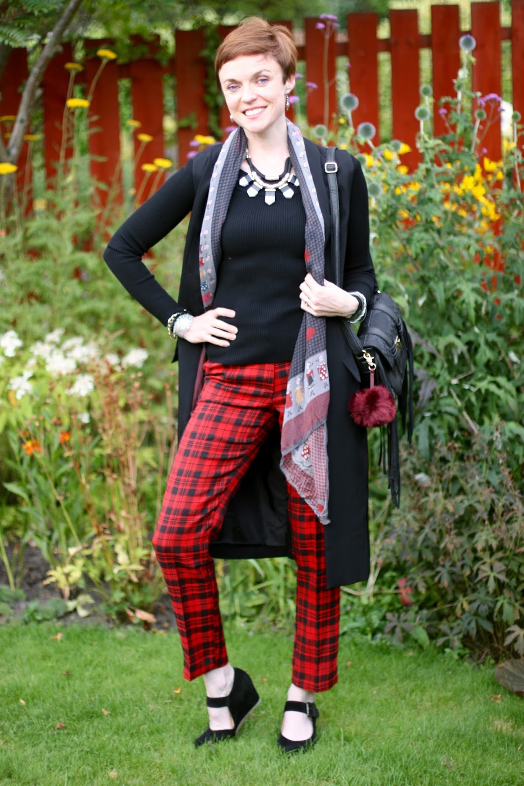 Black and Red tartan with a statement necklace.