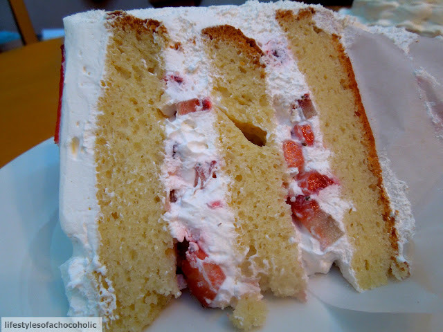 slice of strawberry cake on a white plate