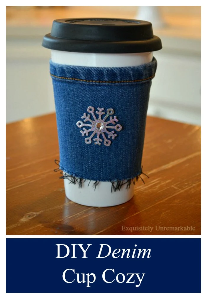 DIY Denim Cup Cozy completed with snowflake sticker on front