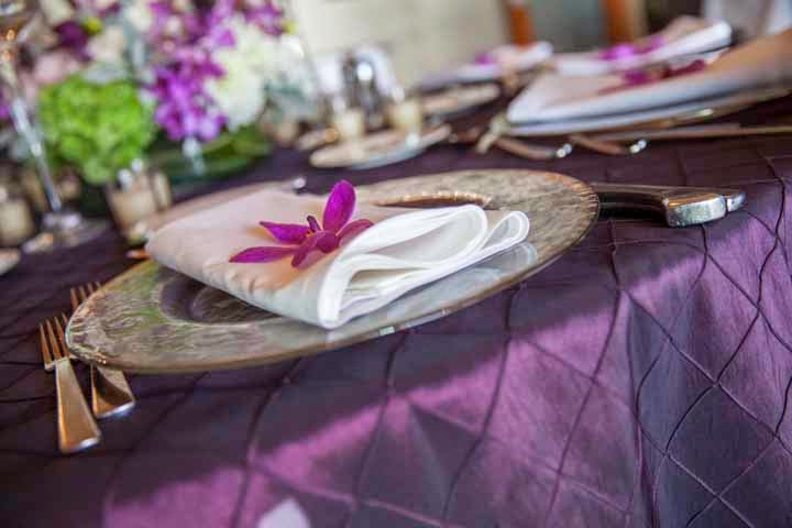 wedding reception table, purple flowers