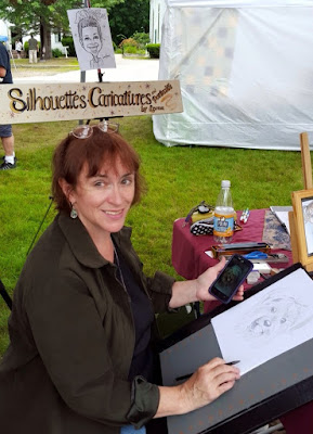 leona hosack drawing a dog portrait at Alfred,Festival in Alfred, Maine 2015 Portraits by Lee