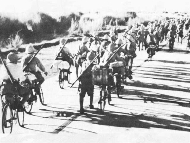 Japanese bicycle troops in Luzon, Philippines, 31 December 1941 worldwartwo.filminspector.com