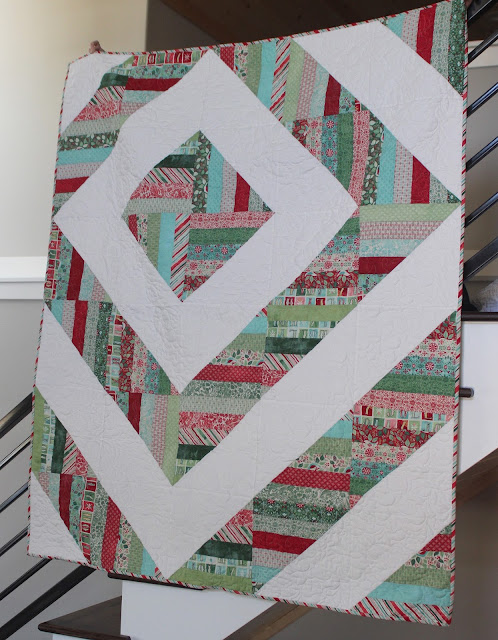 Modern Barn Raising quilt in a Christmas jelly roll