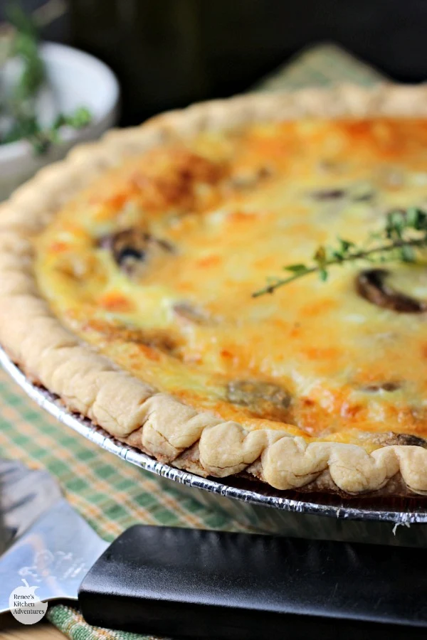 Mushroom Swiss Quiche | by Renee's Kitchen Adventures - easy recipe for quiche full of mushrooms, thyme, eggs and Swiss cheese. Great #vegetarian option for breakfast, brunch, lunch or dinner. #SundaySupper #RKArecipes 