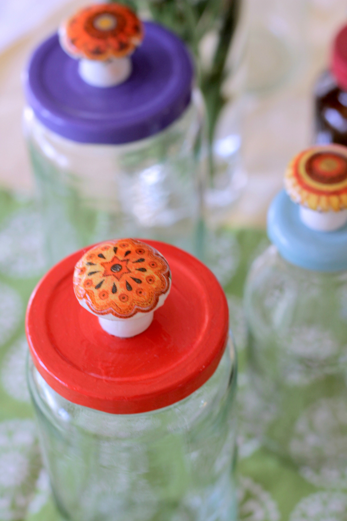 Recycled Jars with painted lids and faux ceramic knobs