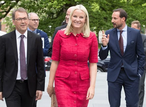 Crown Princess Mette Marit wore Prada dress and Christian Louboutin Simple Pump. She carried beige clutch bag