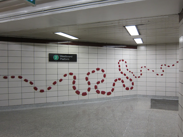 The 'particles' of Ossington Particles lead the viewer on through the station...