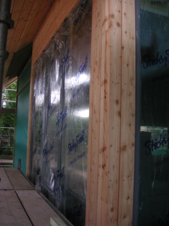House build 2011: Progressing with roof, larch cladding and window ...