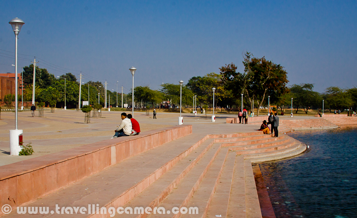 City Beautiful Chandigarh has got another Lake apart from the famous Sukhna Lake. It's situated in very peaceful region of Sector 42. Let's have a quick Photo Journey of Lake - 42 in City Beautiful of Punjab...Hope you have already visited the Sukhna Lake, if not let's have a quick Photo Journey HERE. Although the new lake at Sector-42 can't be compared to Sukhna Lake, but this is again a beautiful gift to residents of Chandigarh, especially for folks living in southern part of the city. Just have a look at this beautiful lake in above photograph - It's not as big as Sukhna...As of now, the lake hardly get much tourists but surely popular among local residents. Families love to come to this place during evenings. This Photo Journey is from noon time, when there were very few people - Few couples from Punjab University, Cricket fans of Chandigarh who were playing in surrounding gardens and some families for Picnic etc...I have heard that this lake in sector-42 of Chandigarh looks amazing during late evening, Blue Hour and Night. Light arrangements are done really well.For now, it's one of the decent places for couples to spend some nice time. All other places in Chandigarh are much crowded like anything - Be it Sukhna Lake, Rock Garden, Rose Garden or other huge parks around the city. Although conveyance is one of the challenge for now...This new lake in Sector-42 of Chandigarh is for festivals like Chhat Puja, when residents need a proper place to continue the rituals. This lake is spread over 3 acres(approximately) in Chandigarh’s southern part of Sector 42...Sector-42 Lake has been officially declared by the administration as the place for religious worship and activities, although there are some boards around it which mention about some restrictions as well. The new lake is being proved as an ideal site to thousands of people living in the southern sectors of the city to perform their religious ceremonies like Chhat Puja...The city residents are fully utilizing the place for religious functions such as Chhat Puja, Ganesh Puja etc. at the new lake in Sector-42 of Chandigarh.The outline of the lake has been protected by constructing retaining wall with stone masonry to retain the earth and water.  The lake has been constructed to provide a place of relaxation and seclusion, like Sukhna Lake, for the residents of Southern Sectors of Chandigarh.Saparkling water of Sector-42 Lake, Chandigarh. Most of the regions of this Lake were clean and shiny.But one of the corner was in extremely bad shape... Hope Authorities will be serious about this place as well and ensure that City Beautiful of India remains neat and clean...