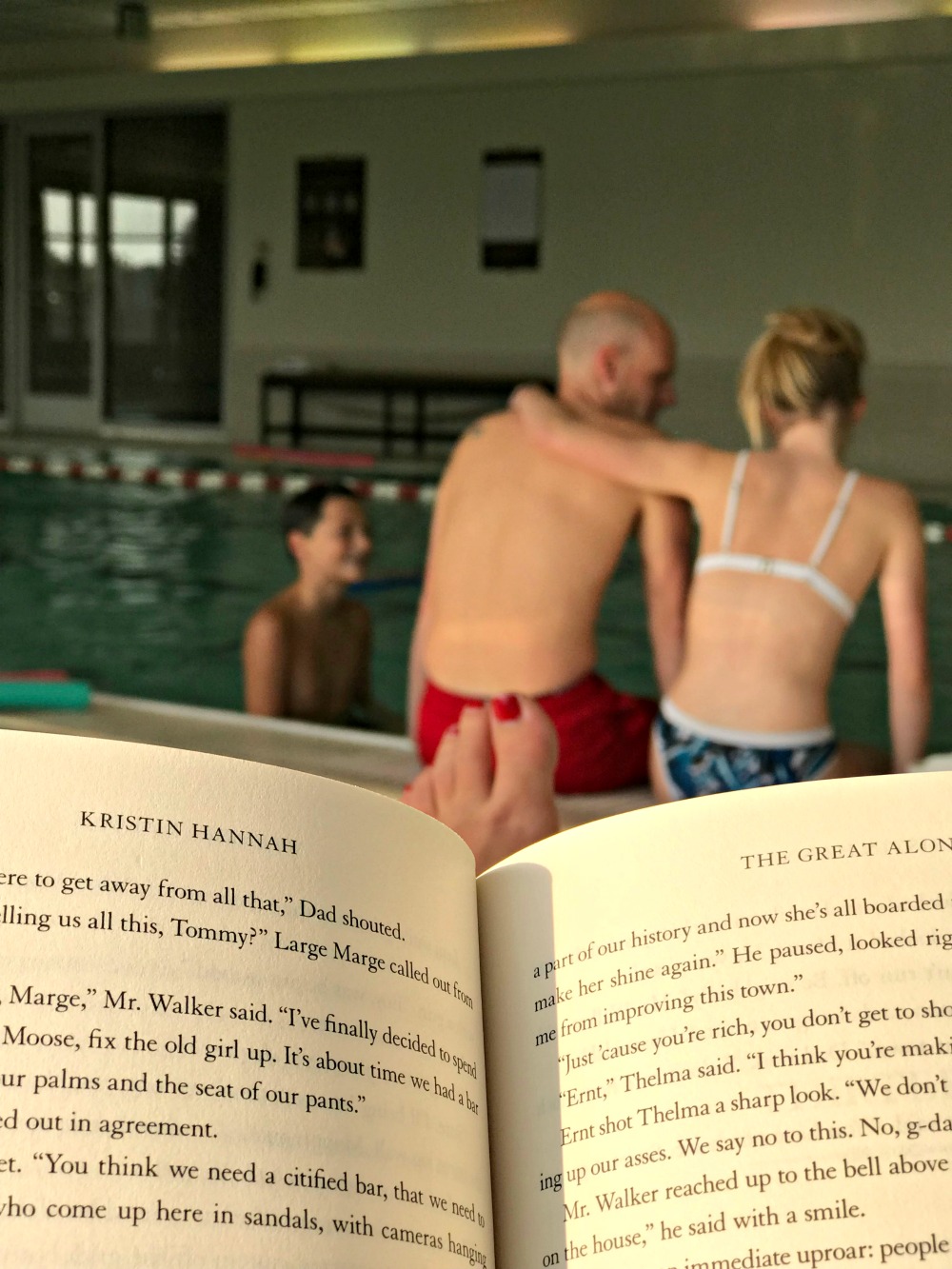 indoor hotel swimming pool dad with teens