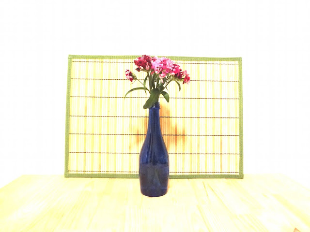 flowers in blue bottle, high exposure
