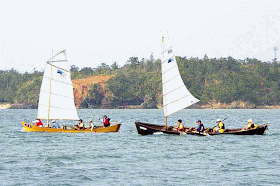 2 sailing sabani boats, race