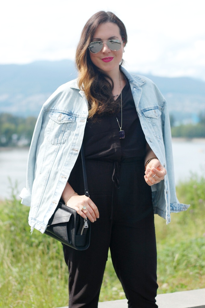 Forever 21 jumpsuit, Zara oversized denim jacket and a Proenza Schouler clutch are combined in the latest outfit post by Vancouver fashion blogger Aleesha Harris of Covet and Acquire.