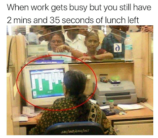 office worker playing cards when there's a queue 